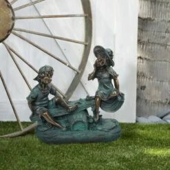 Brand new π Alpine Corporation 14" Indoor/Outdoor Girl and Boy Playing on Teeter Totter Statue Yard Décor Bronze π