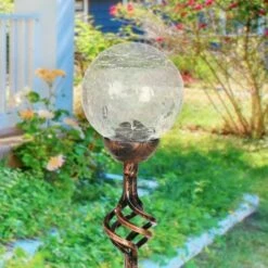 Best deal 😍 31" Solar Resin/Glass Crackle Ball Finial Garden Stake Bronze - Exhart ✔️ -Garden Decor Shop unnamed file 3156