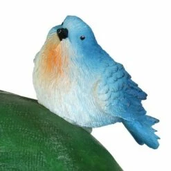 Buy ⭐ 10" Resin Solar Welcome Racoon With Birds Statue Green - Exhart 👍 -Garden Decor Shop unnamed file 574