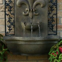 Buy 🎁 Sunnydaze Decor Sunnydaze 33"H Electric Polystone French Lily Design Outdoor Wall-Mount Water Fountain, Florentine Stone Finish 😍 -Garden Decor Shop unnamed file 6961