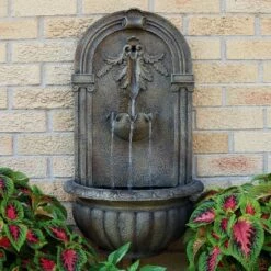 Cheap ❤️ Sunnydaze Decor Sunnydaze 27"H Electric Polystone Florence Outdoor Wall-Mount Water Fountain, Florentine Stone Finish ✨