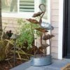 Best deal 👏 Alpine Corporation 45" Iron Flamingo with Flower Tier Fountain Bronze 🧨 -Garden Decor Shop unnamed file 7978