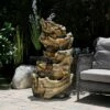 Budget 😉 Alpine Corporation 47" Resin Outdoor 5-Tier Tree Trunk Waterfall Floor Fountain with LED Lights Brown ⌛