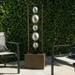 Best reviews of 💯 Alpine Corporation 55" Metal Modern Column Fountain with Stainless Steel Orbs Silver/Brown ✔️