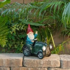 Best Pirce ✔️ Alpine Corporation 10" Polyresin Solar Tractor Riding Gnome with LED Lights Green ⌛